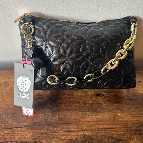Vince Camuto Cosmetic Bag Black
Quilted Gold Chain Charm Strap Pouch
NWT - Picture 5 of 5